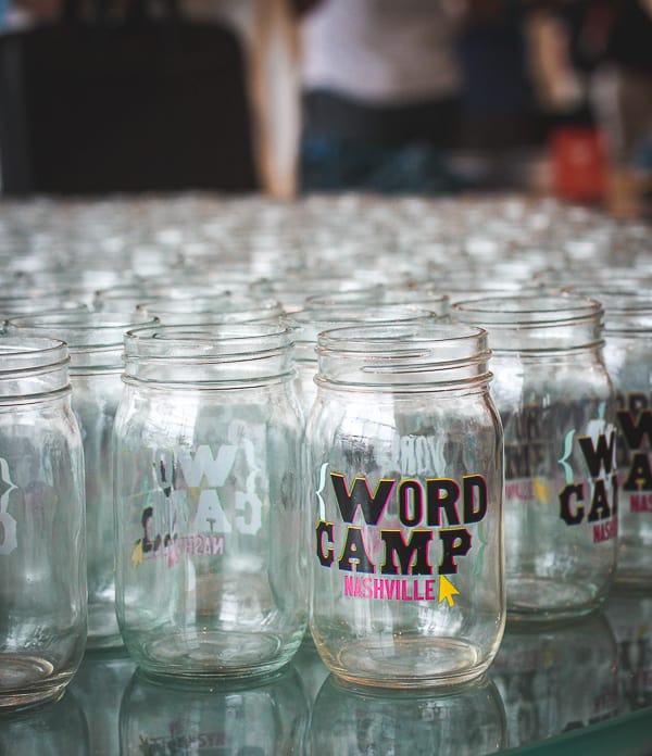 Attendee swag included these branded mason jar glasses.