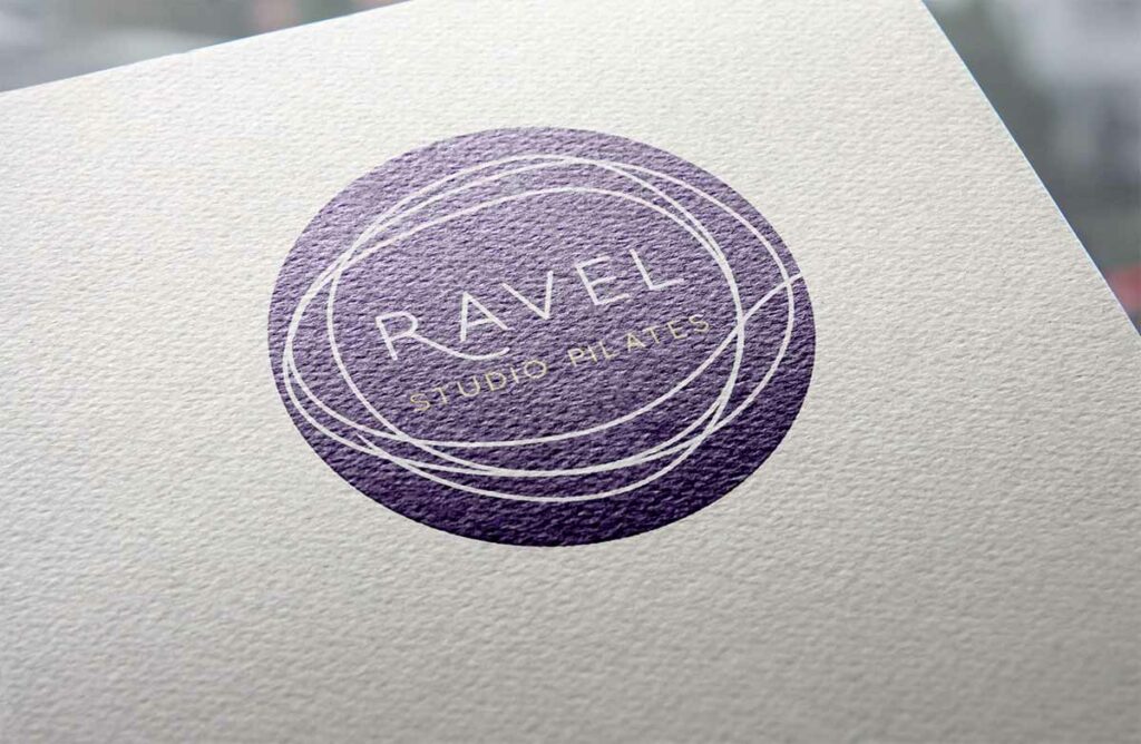 A logo with purple circle and a swirl of threads