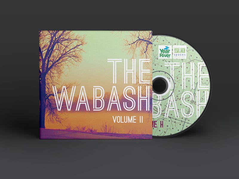 The Wabash Eco-Wallet, featuring a colorful photo of the river and a tree, with the disc peeping out. The cover says "The Wabash Volume II"
