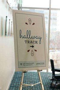 Large scale sign that says "Hallway track"