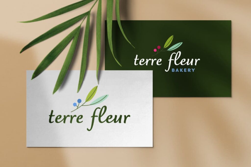 The Terre Fleur logo features a hand-drawn branch with leaves and berries, paired with approachable & legible type.